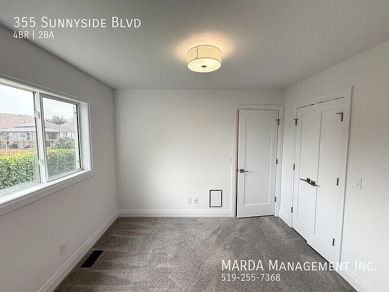 355 Sunnyside Blvd — Photo 31