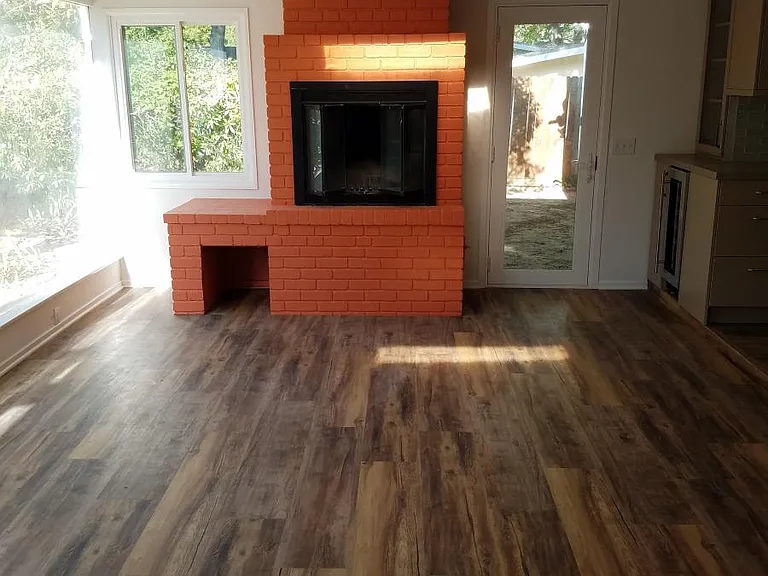 Fireplace and dining room view