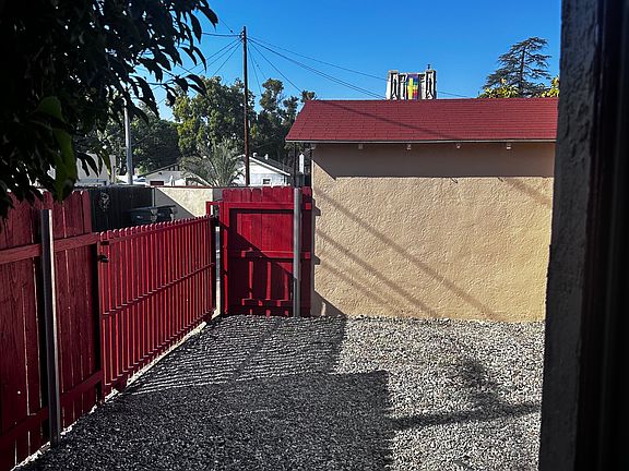 private yard or parking area with locking gate.
