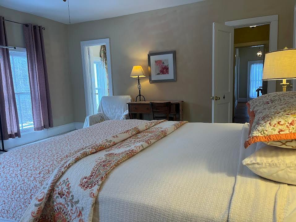 View of one bedroom, queen-size bed sleeps 2, private bathroom