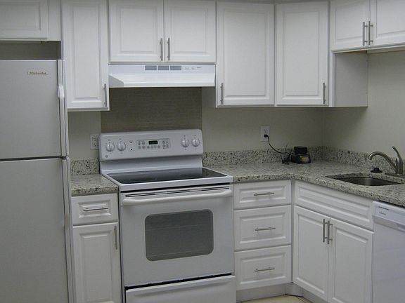 Newer kitchen cabinets with granite countertops
