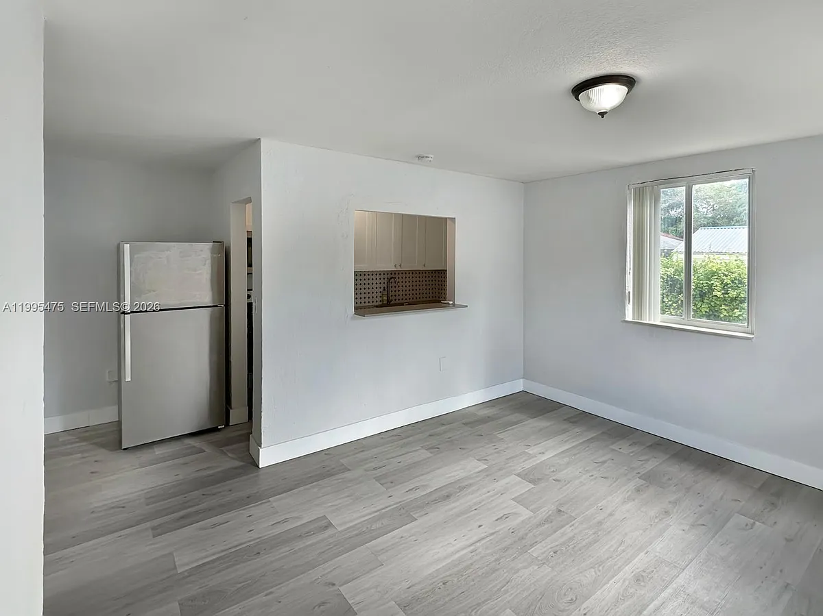 Building Photo - 6647 SW 59th Pl #101