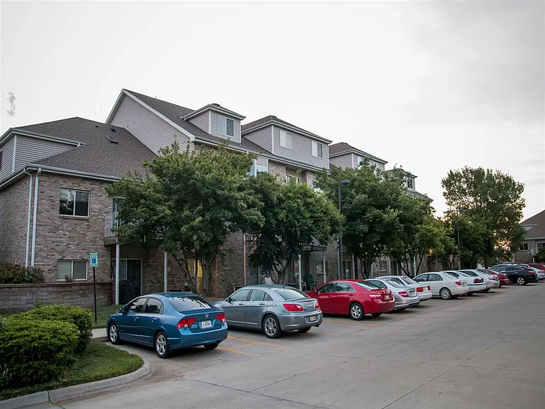 Tree-lined surroundings and convenient parking welcome you home to our charming community setting.
