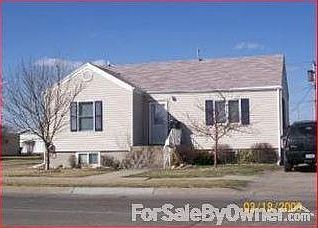 Front Street View : Both trees bloom out beautifully in the Spring. All siding is in perfect shape