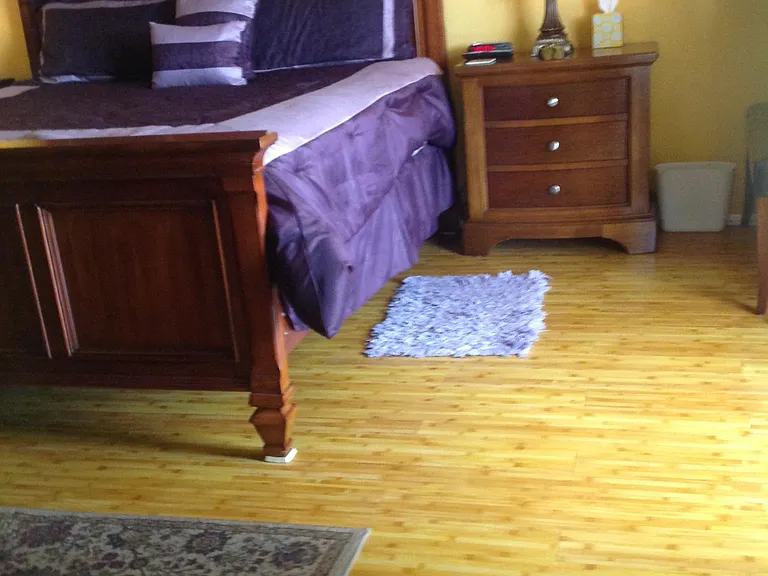 Beautiful bamboo hardwood flooring throughout the unit, adding warmth, elegance, and durability to the living space.