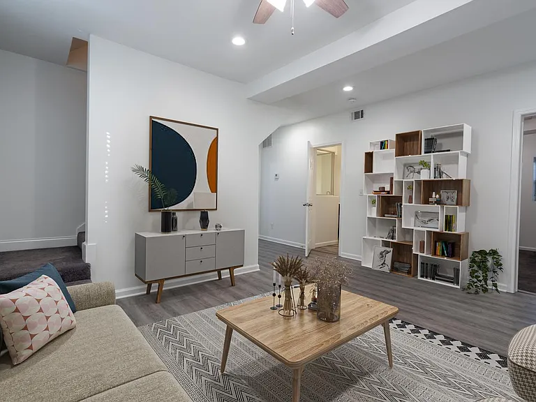 This image shows a virtually furnished space. This space comes unfurnished but can be beautifully furnished by our in-house design team for an additional fee.
