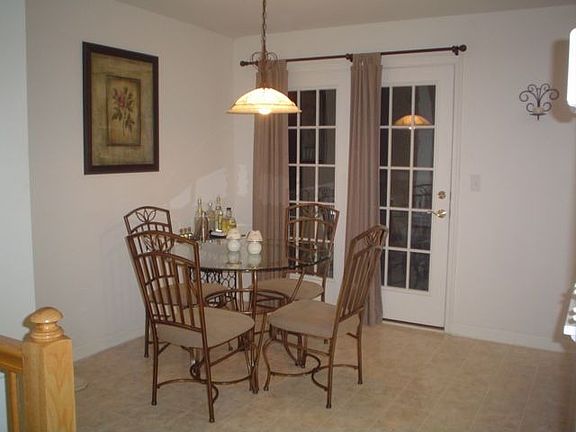 Din.Area off kitchen with French Doors to Deck with stairs to yard