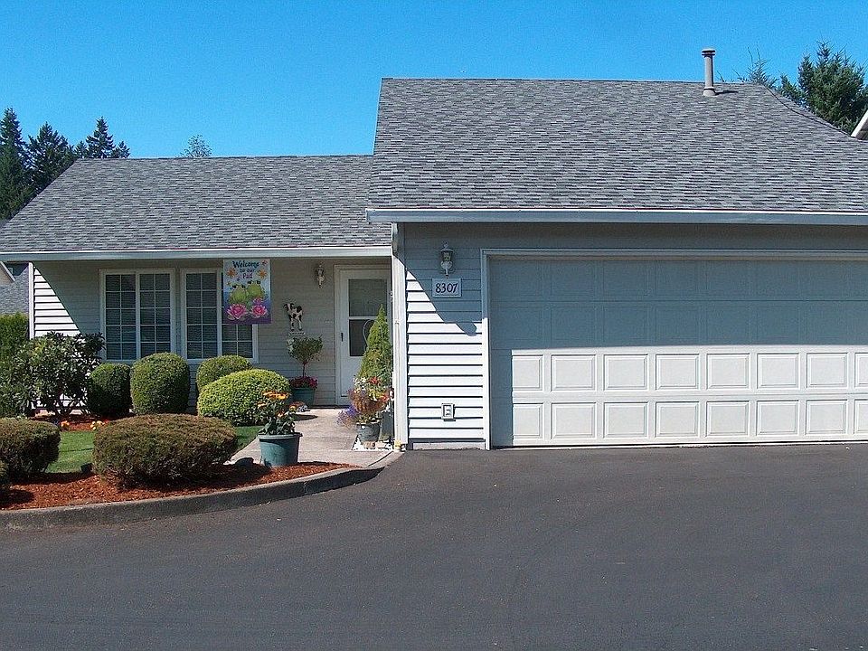 Front with 2 1/2 car garage