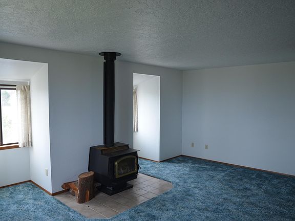 Upstairs living room with wood stove.