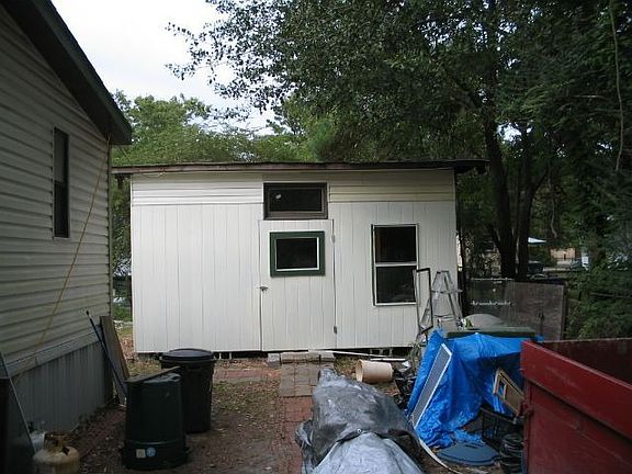 View of shed from driveway