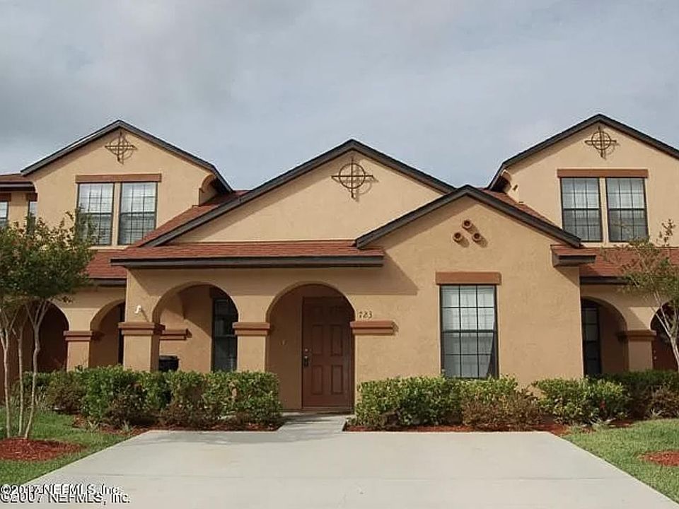 Front with large driveway (can easily fit 2 cars) + street parking available.