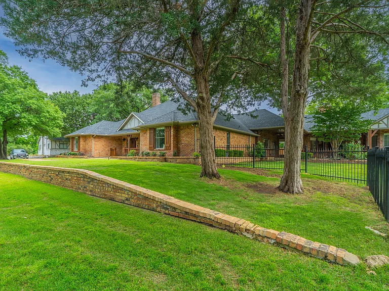 Elegant Brick Estate with Massive Lawn & Professional Landscaping