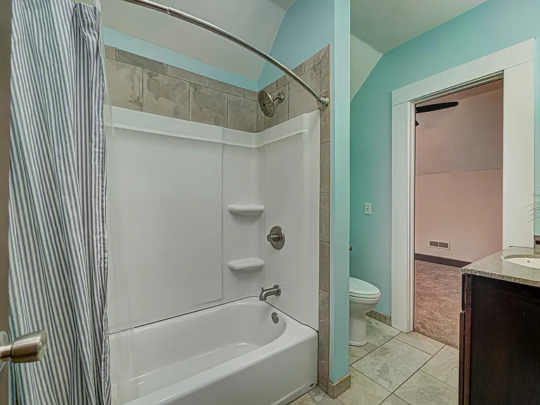 Upstair full bath with shower/tub combo.