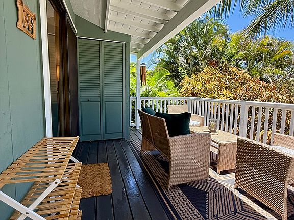 Listen to the birds while sipping your morning coffee on your furnished lanai