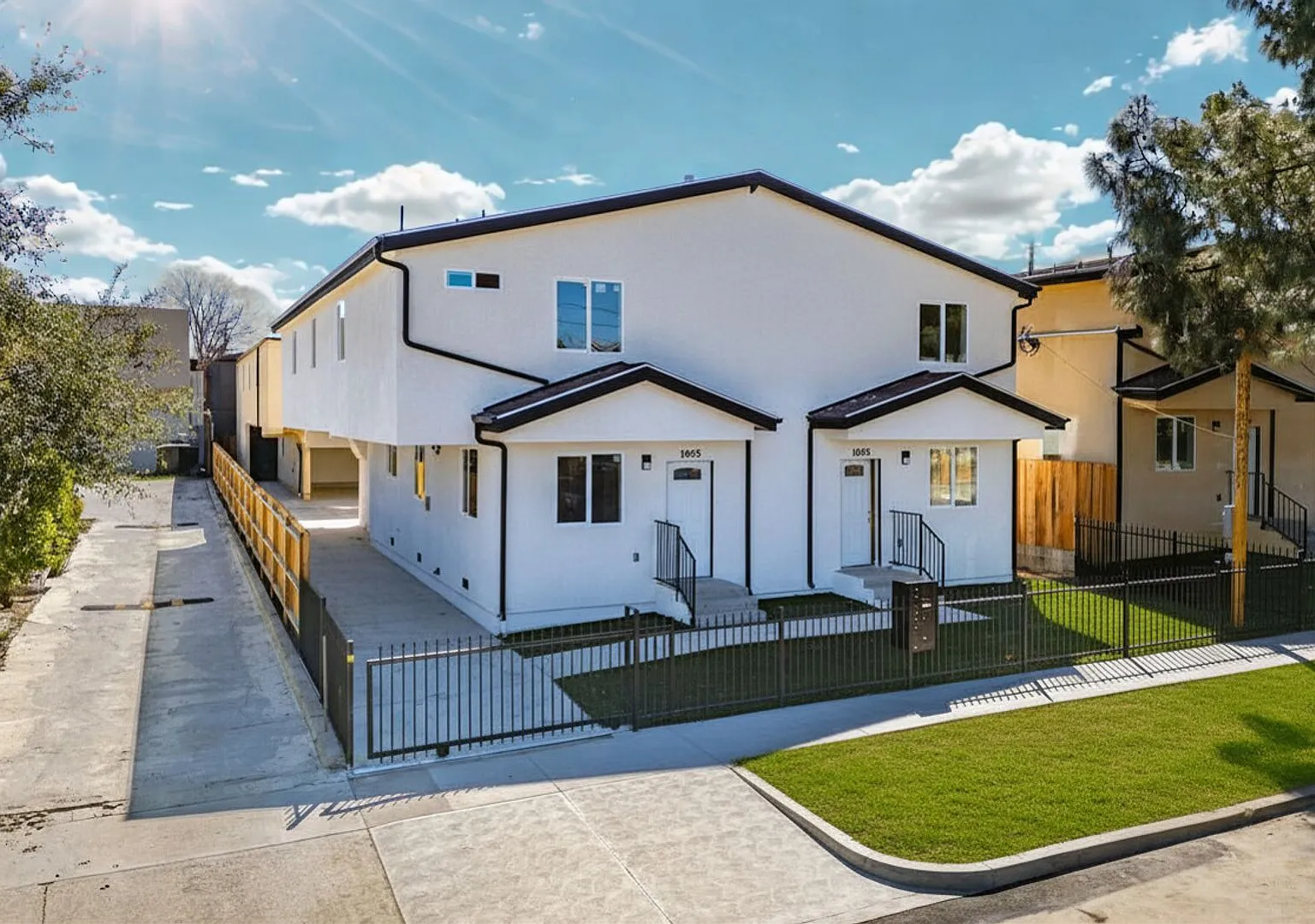 Modern 2026 Townhomes with Massive Bedrooms + Central Air + Brand NEW Appliances + Laundry IN UNIT! — Photo 1