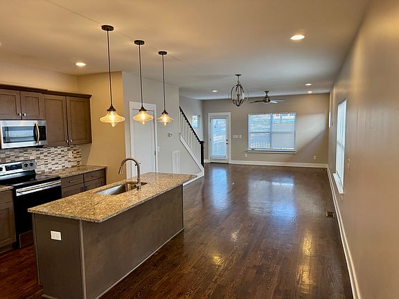 Kitchen, dining, and living room