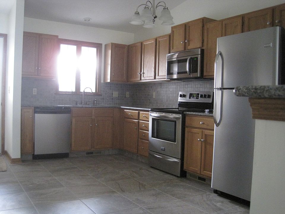 bright kitchen with granite and 18" tile