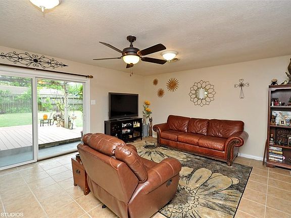 There is a great deck with pergola right off the living area.