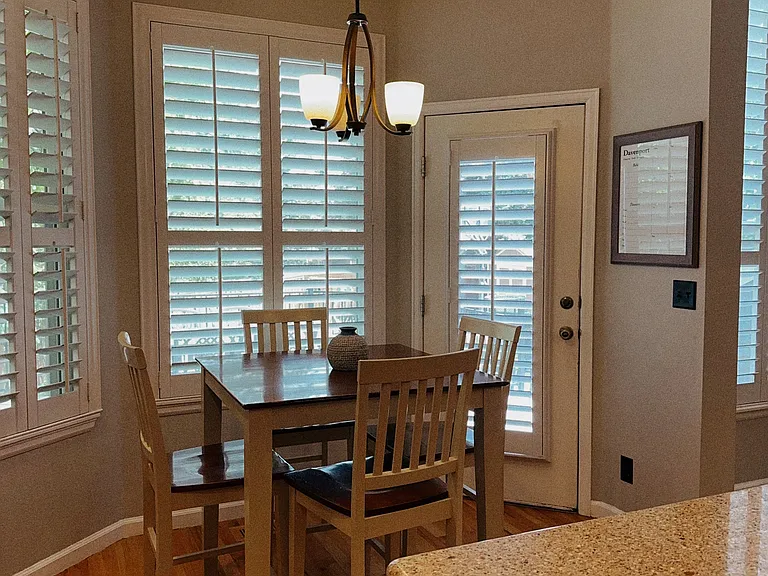 Kitchen eating area - doorway to backyard/deck