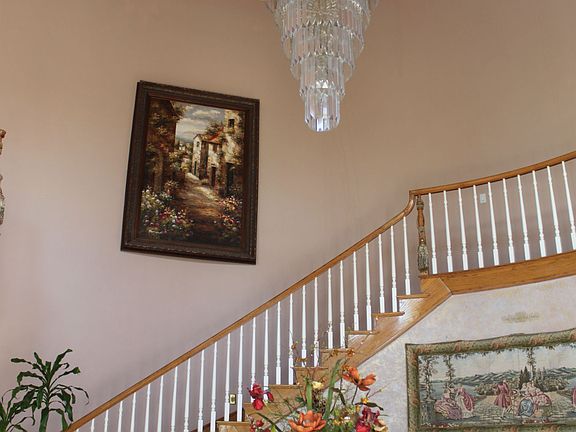 Exquisite chandelier, vaulted ceilings, ample natural light