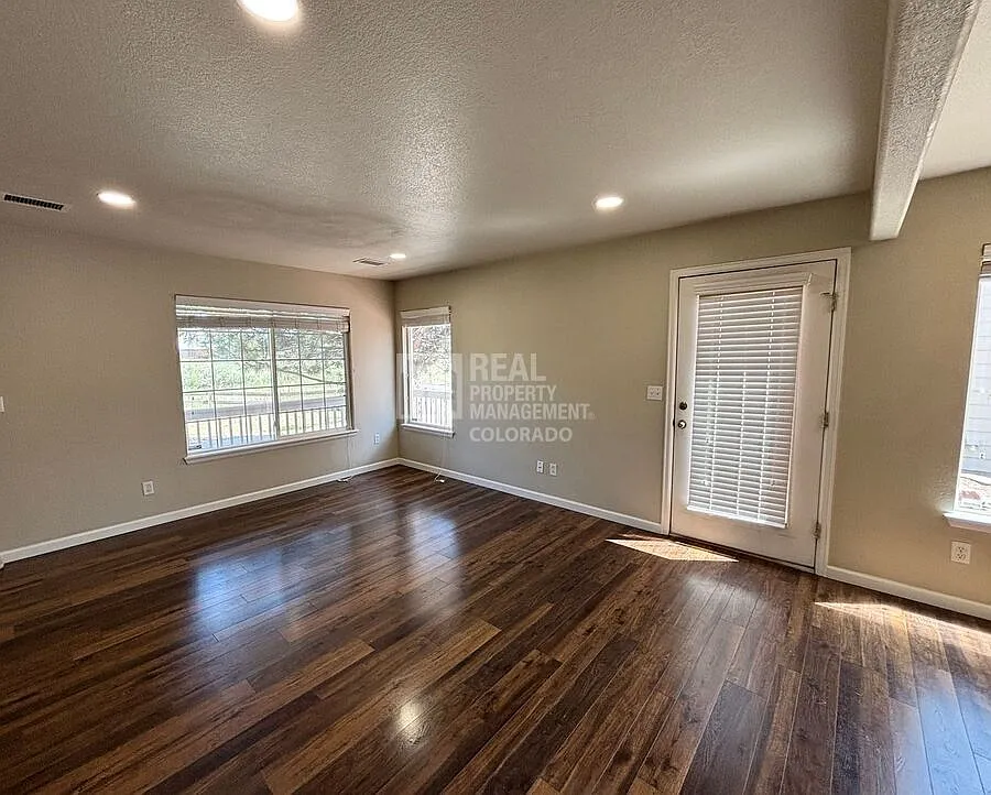 Spacious 3-Bedroom Home with Attached Garage in Green Valley Ranch — Photo 3