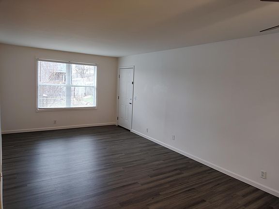 Another view of the living room- open concept. New windows