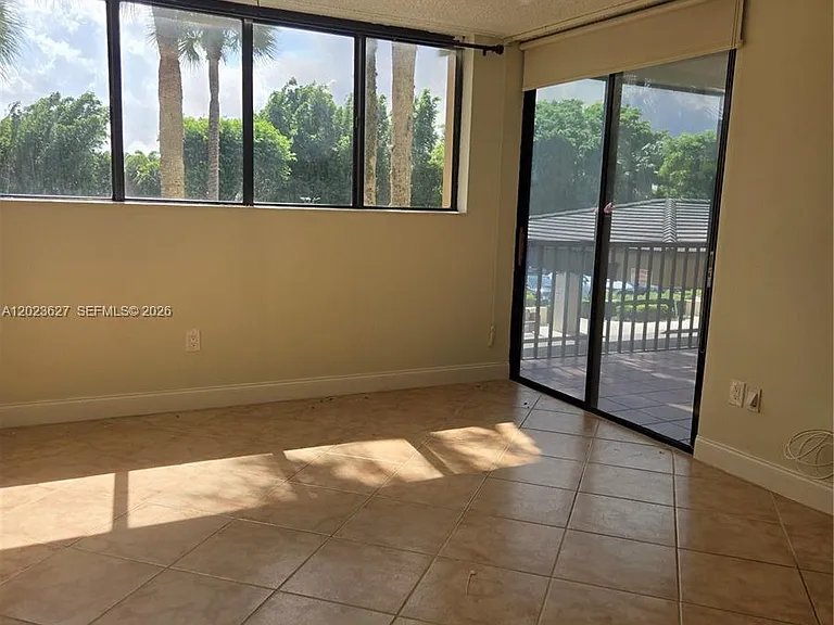 9735 NW 52nd St #208 — Photo 11