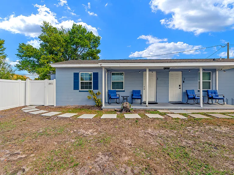 Front porch with porch chairs/table included to enjoy the fenced in backyard