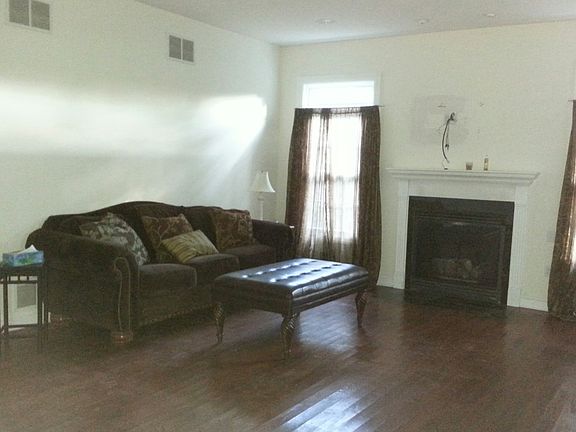 Den; gas fireplace