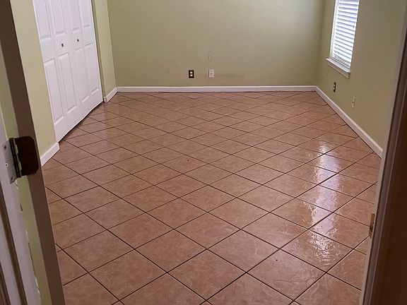 2nd bedroom (I used as my office) downstairs. Has French doors & large closet. (Not renovated yet)