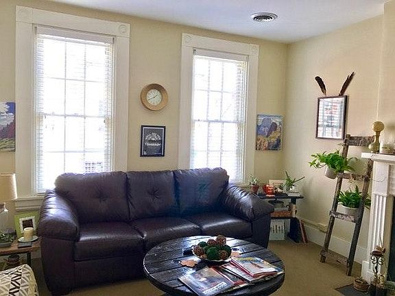 Living room, windows face High Street