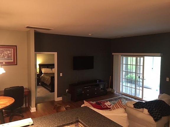 Nice living room with a screen in back porch