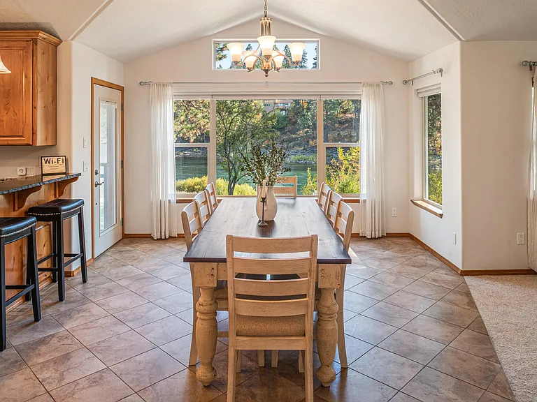 Dining room with panoramic river views
