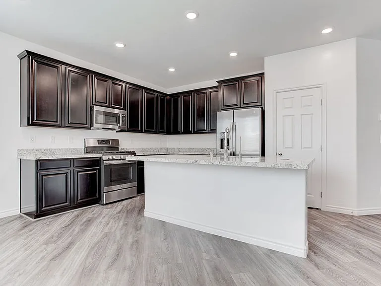 7106 Calvert Cliffs St — Photo 11