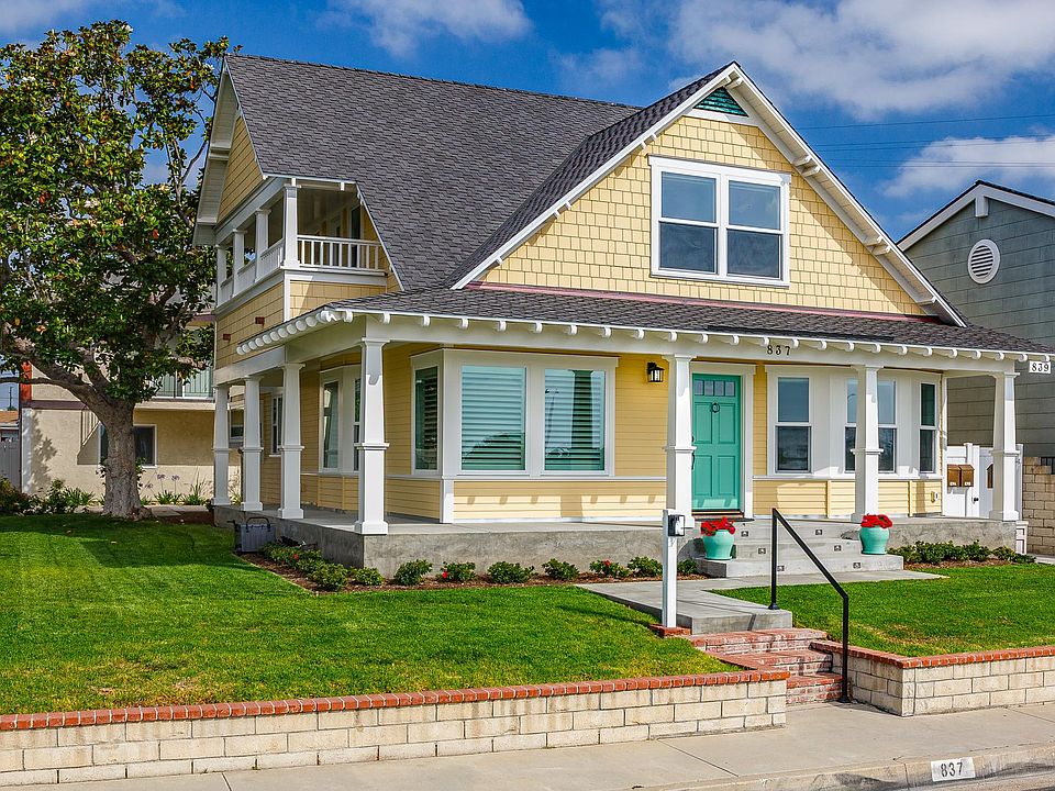 Vintage Craftsmen home, lovingly renovated to include a new wrap-a-round front porch to maximize warm ocean breezes to help transport you back in time to a more gentle, easy pace...