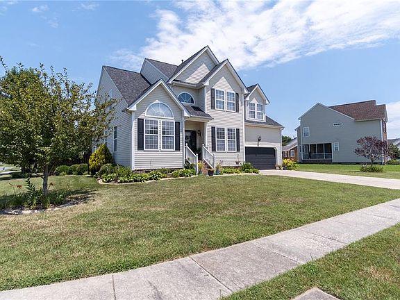 Home sits on huge corner lot.