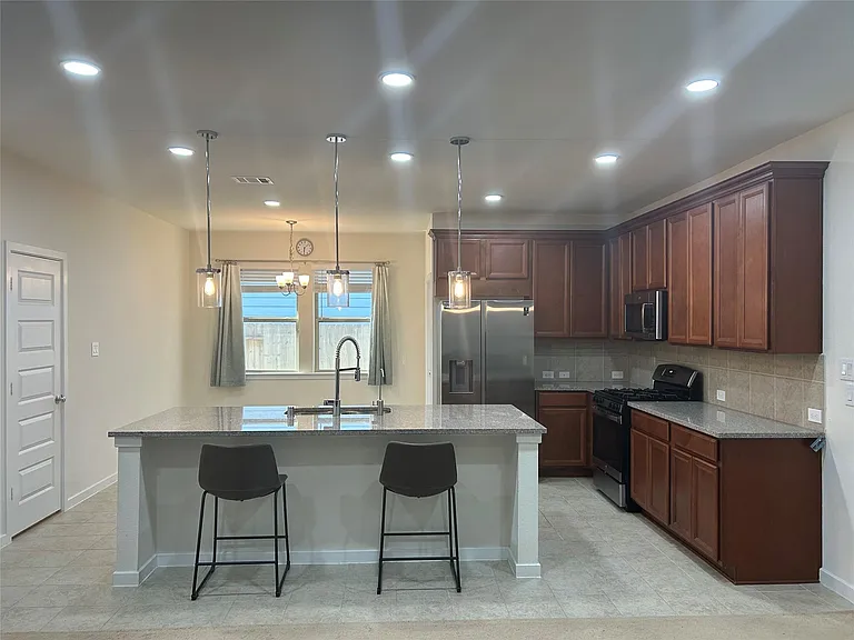 7822 Wyndham Harbor Ct — Photo 14