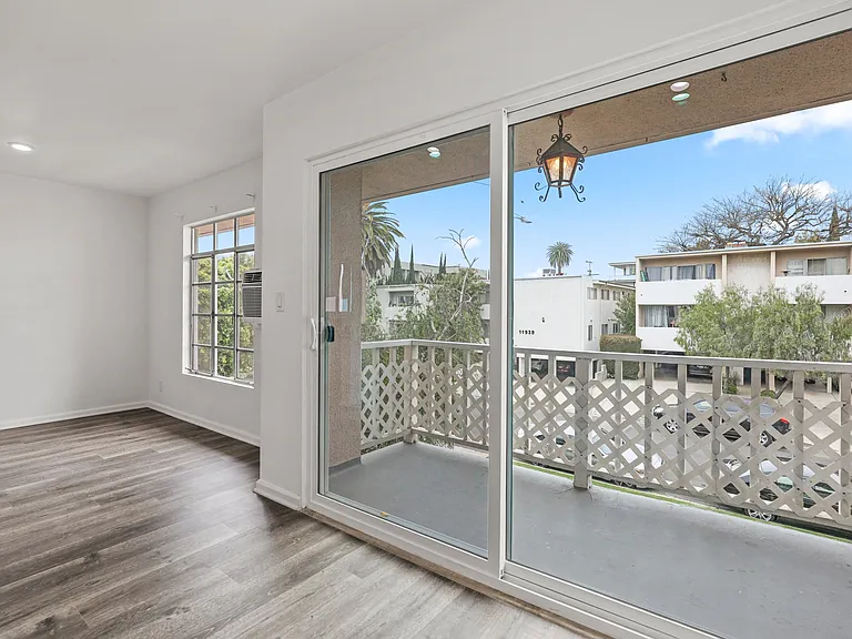 Living Room with Patio and Windows Providing Lots of Natural Light