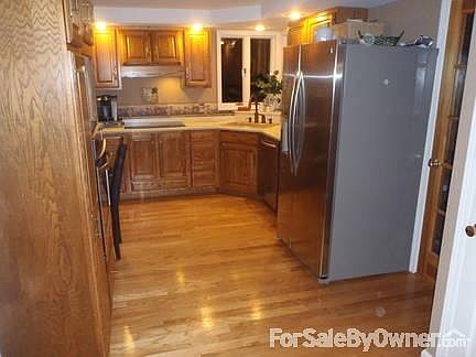 Kitchen
						:
						New stainless steel dishwasher and oven. New induction stovetop
