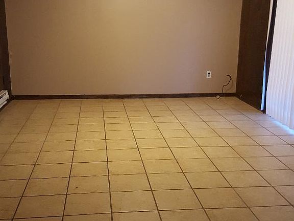 Back Room to the right is Patio Door leading out into the Sun Room