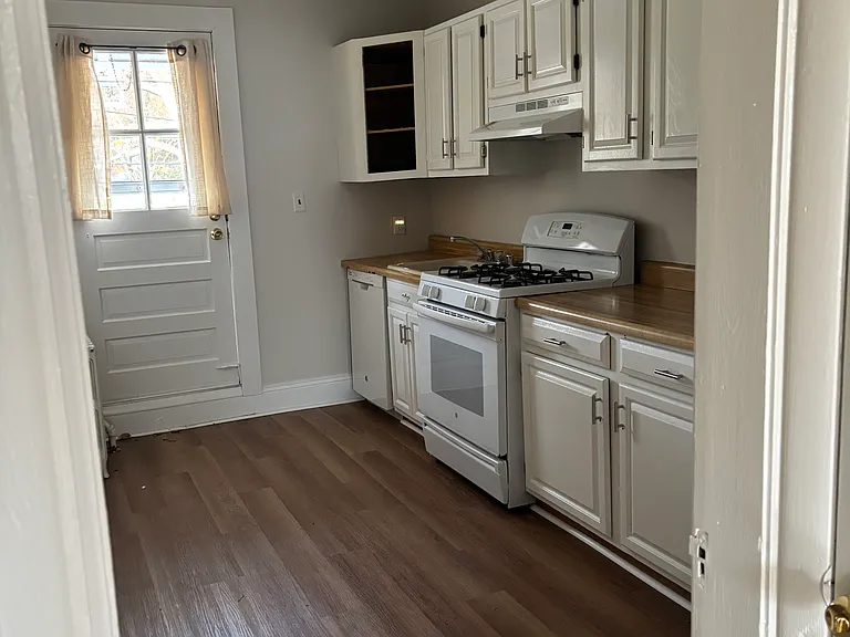 New kitchen floor with door to deck/rear entrance