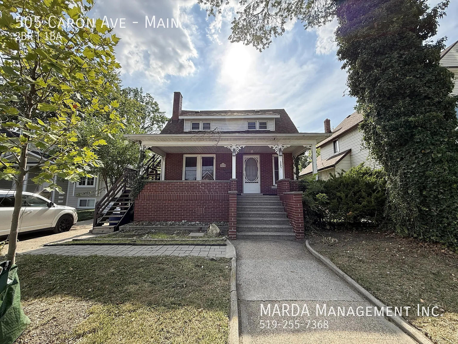 Charming 2 Bed/1 Bath Main Floor Unit W/ Driveway + 60% Of Utilities! — Photo 1