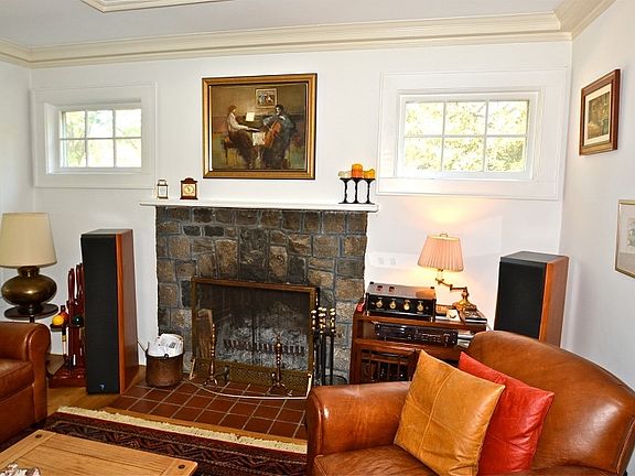 WOOD BURNING STONE FIREPLACE