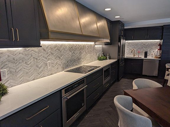 Piano, fireplace, and kitchen room 3