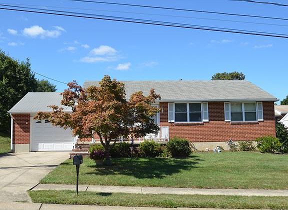 Charming brick ranch with tidy landscaping