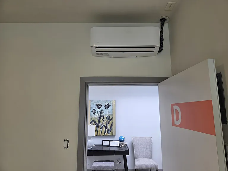 Unit A/C and heating with remote control.
