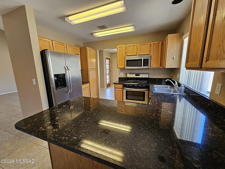 9827 N Stonecreek Pl — Photo 7