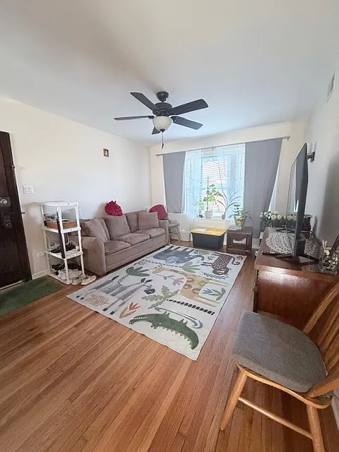 Building Photo - 3216 N Menard Ave #1