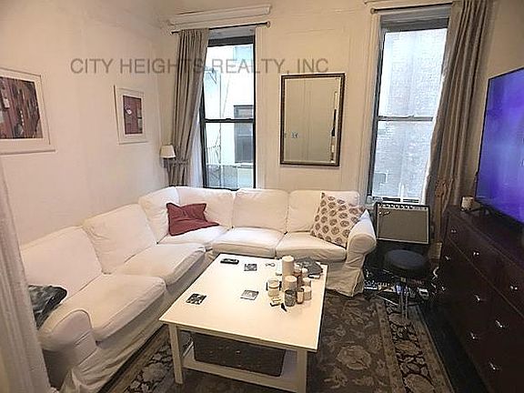 5th image of 211 E 10th St APT 12