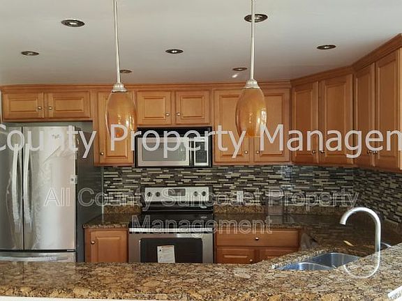 5th image of 4900 68th Ct N Unit 4900
